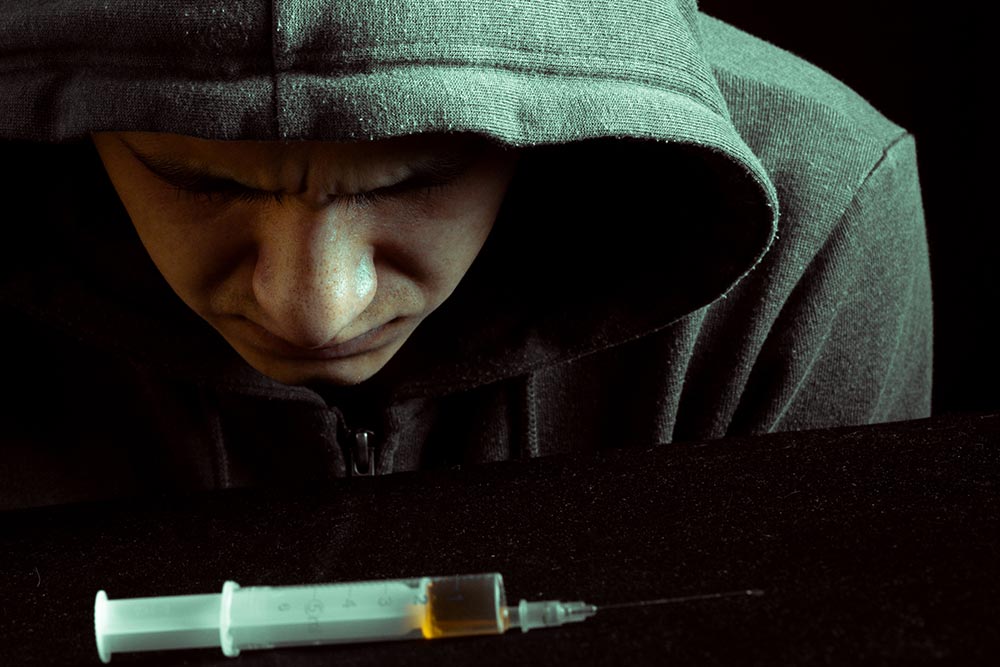 anaheimlighthous-whats-the-definition-of-relapse-article-photo-grunge-image-of-a-depressed-drug-addict-166773764