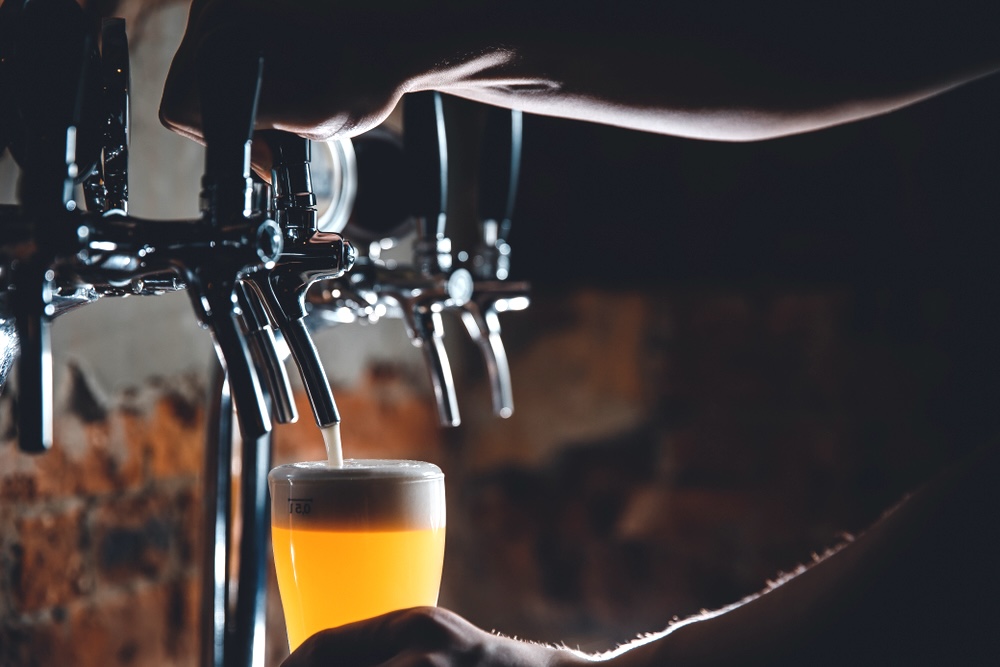 Mug being filled with draft beer