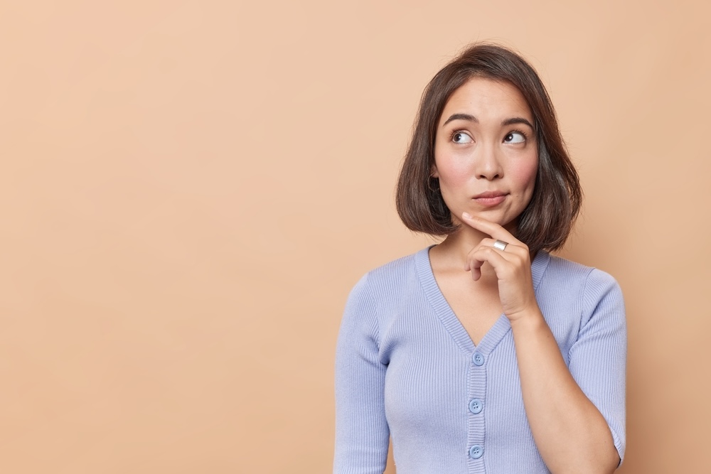 Woman with a questioning face thinking about rehab myths