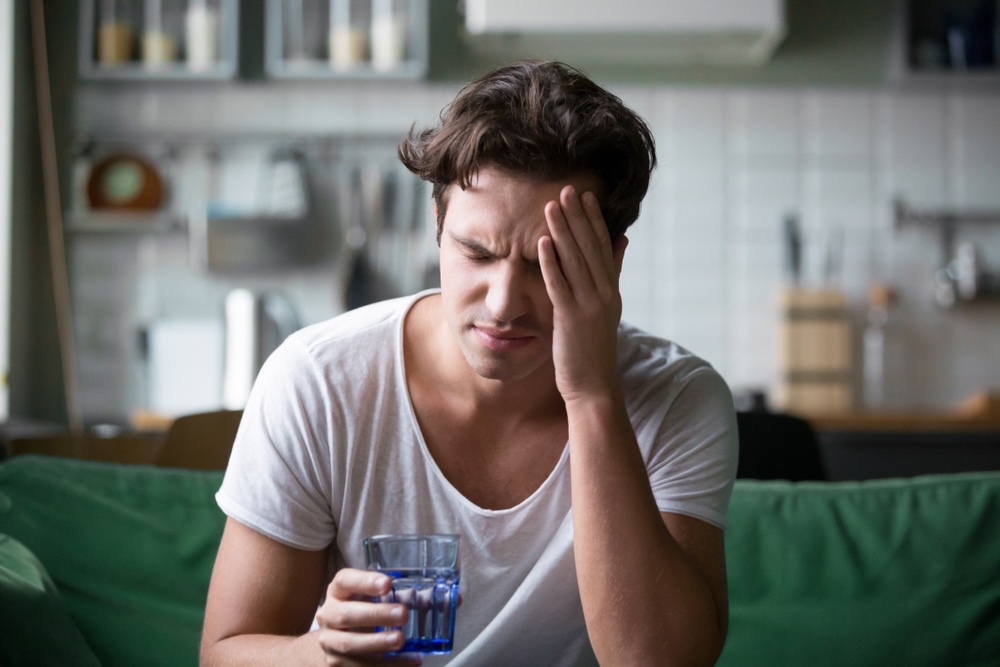 Man suffering from kratom withdrawal